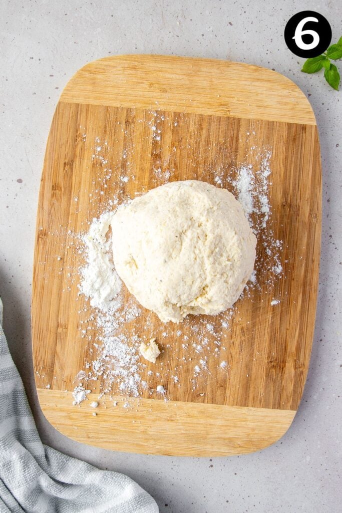 gnocchi dough on a floured board.
