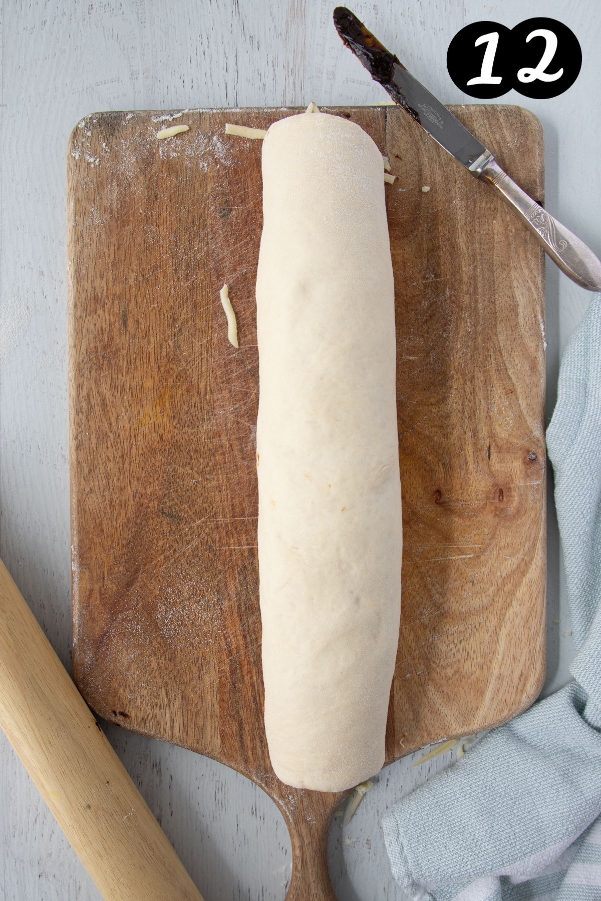 rolled dough on a wooden board
