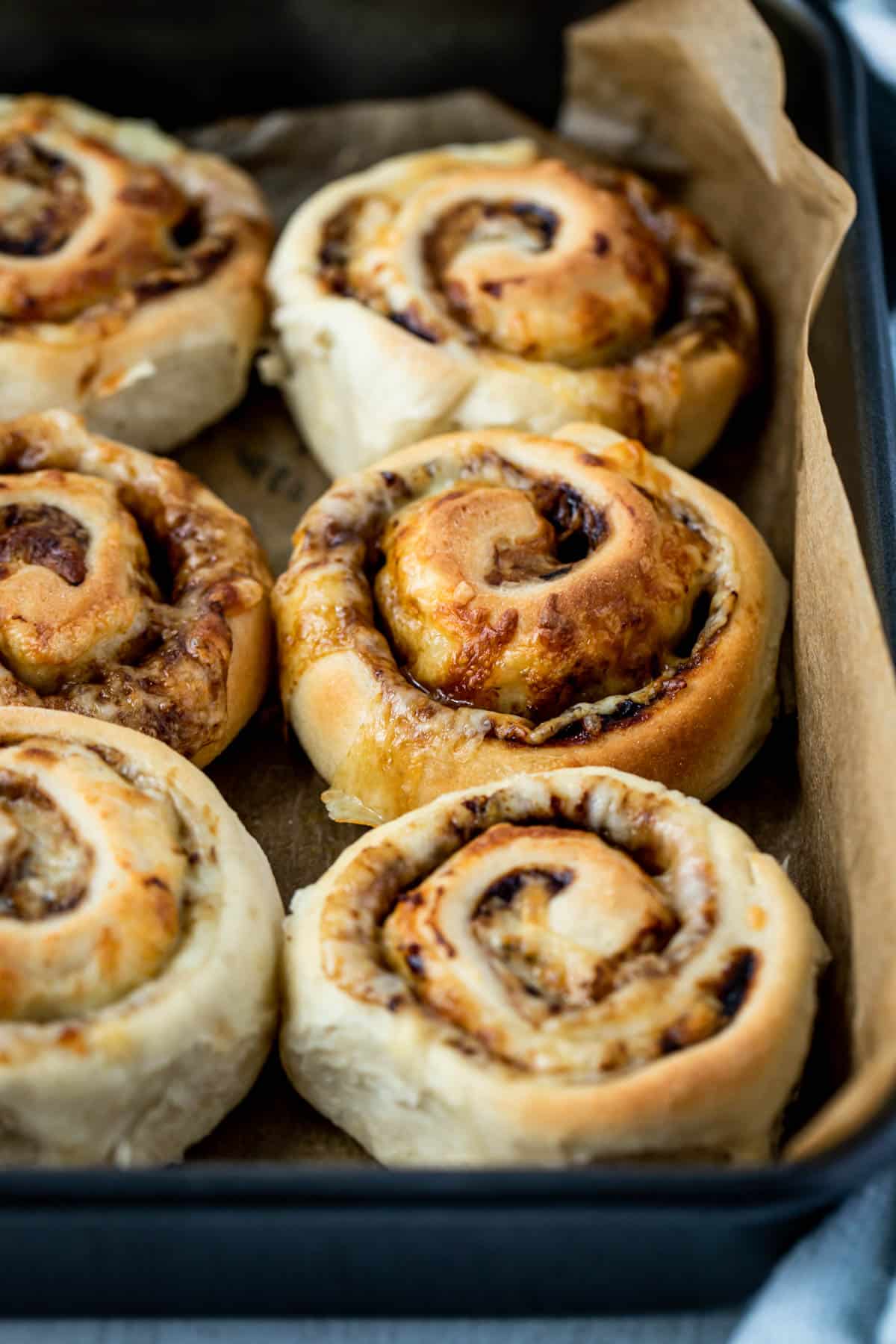 cheese and vegemite scrolls in a baking tray