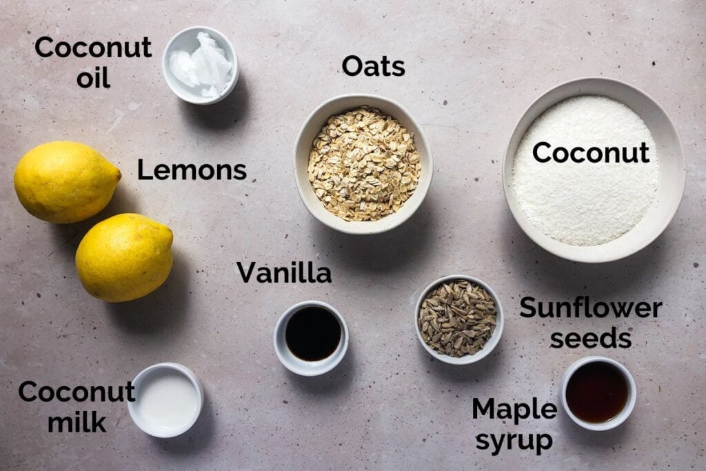 all ingredients for lemon bliss balls, laid out on a table.