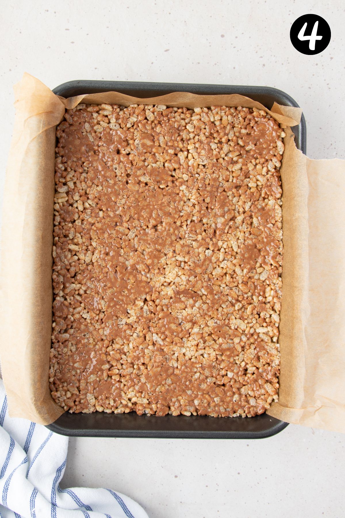 mars bar slice mixture pressed into a slice tin.