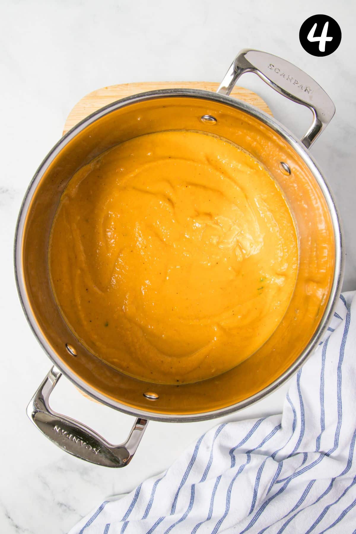 blended pumpkin and carrot soup in a large pot.