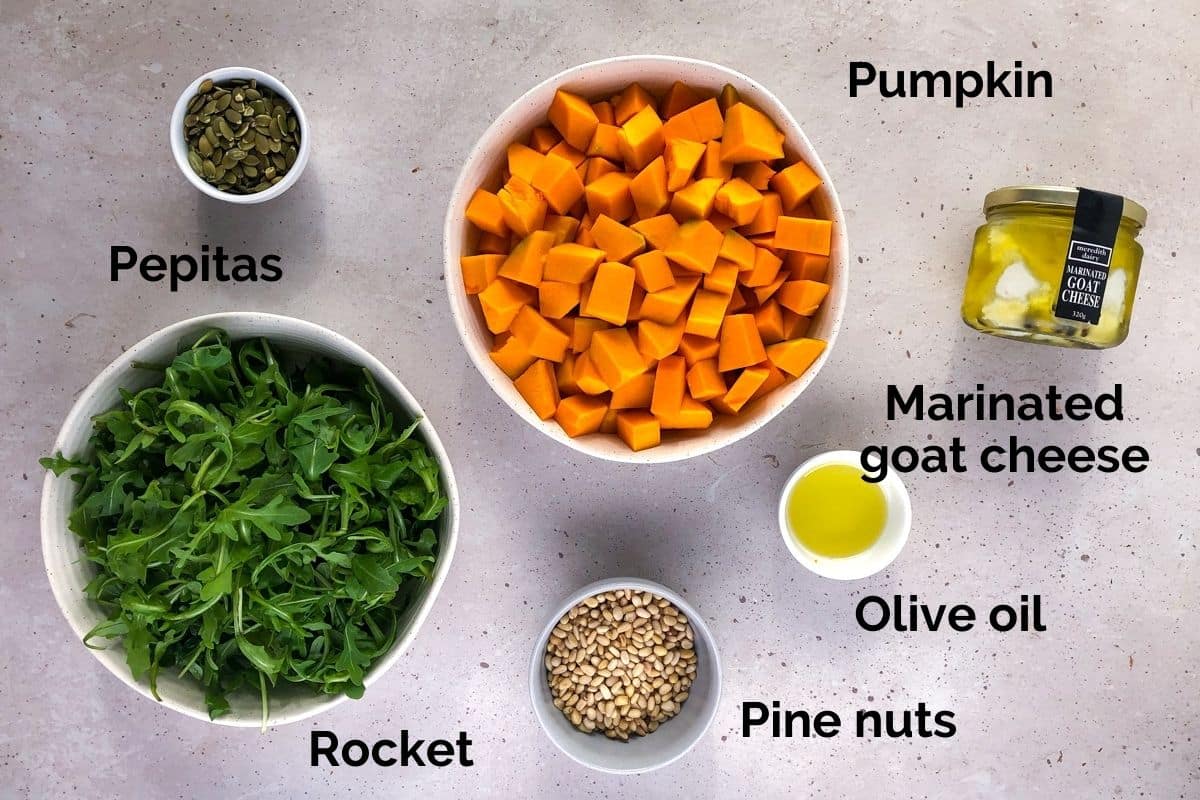 all ingredients for roast pumpkin salad laid out on a table.