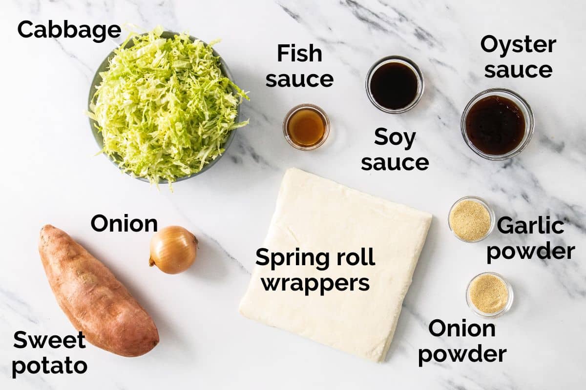 all ingredients for vegetable spring rolls, laid out on a table.