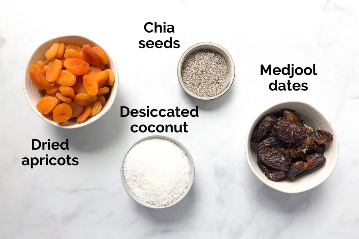 all ingredients for apricot balls, laid out on a table.