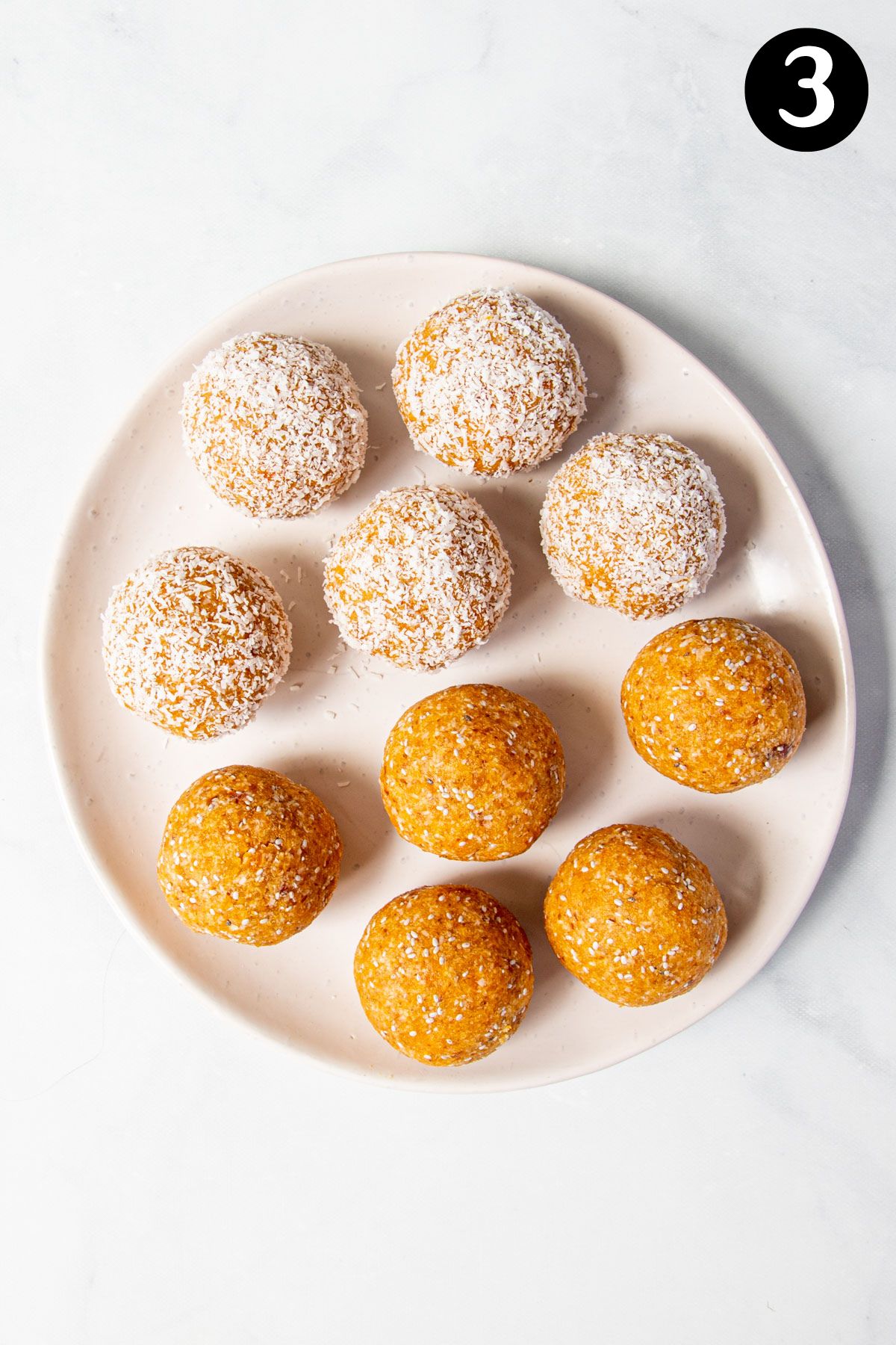 apricot balls on a plate.