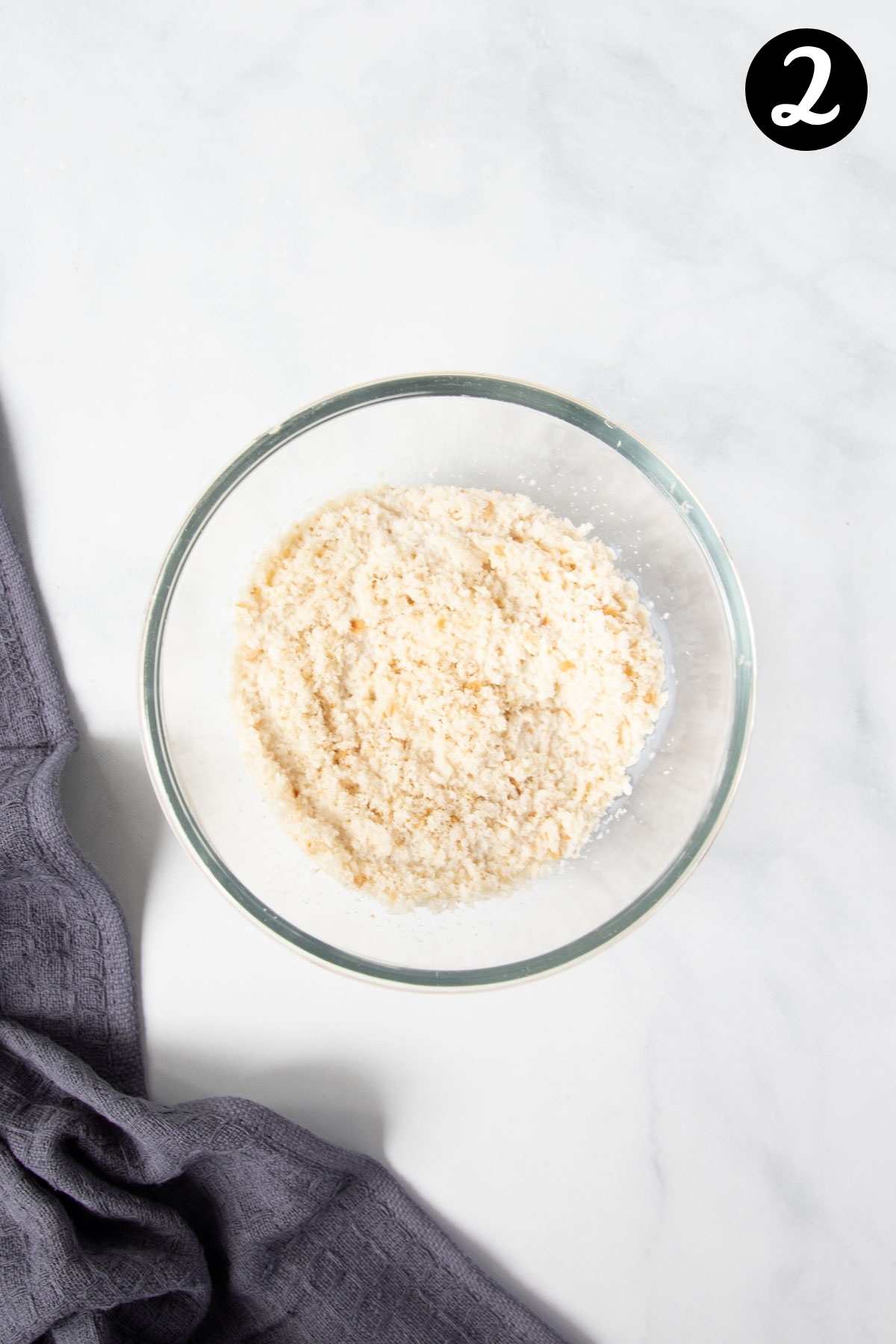 fresh breadcrumbs in a bowl on a table.