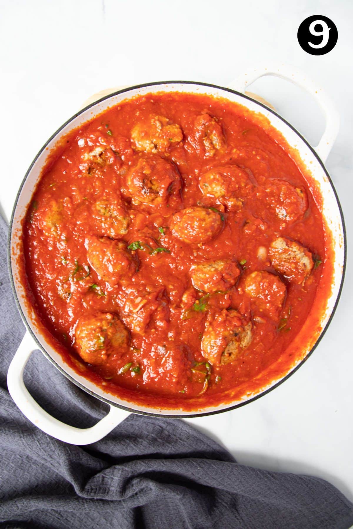 meatballs in tomato sauce, in a pan.