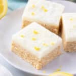 pieces of lemon slice arranged on a white plate.