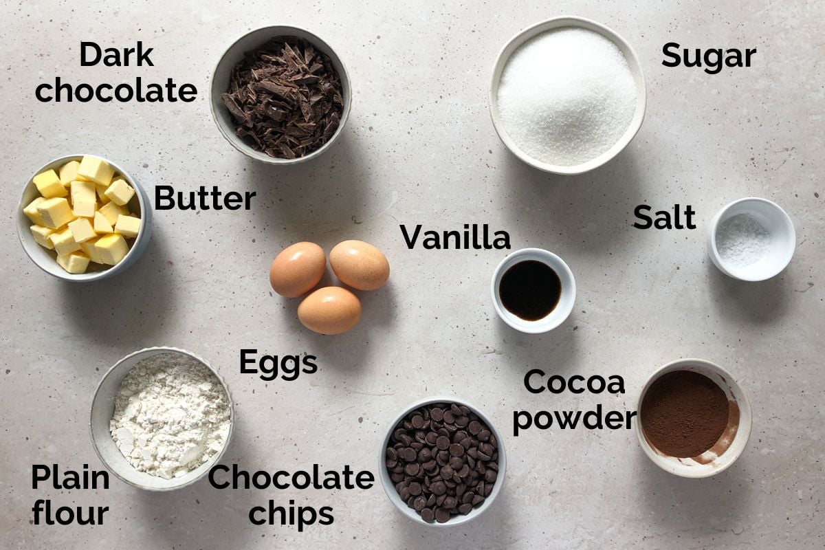 all ingredients for triple chocolate brownies, laid out on a table.
