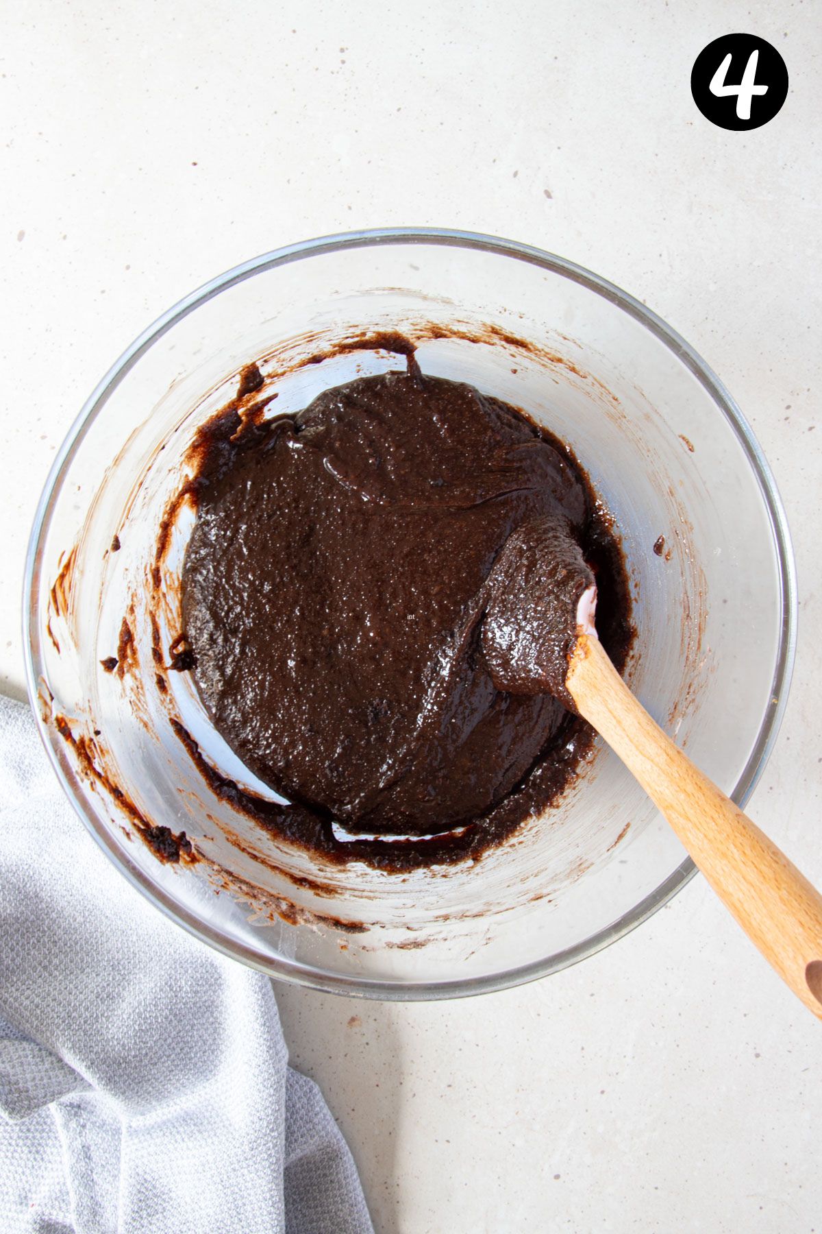brownie batter in a glass bowl.