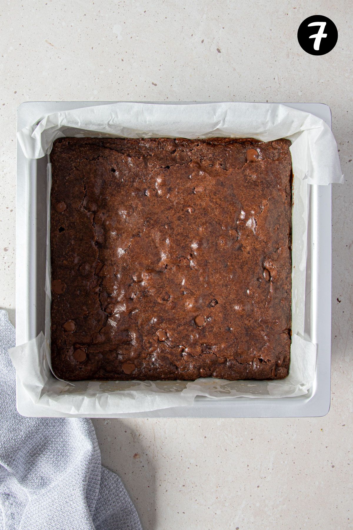 finished brownies in a square baking tin.