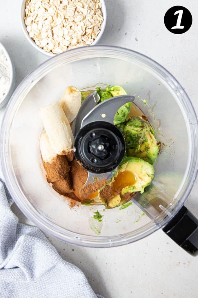 banana, avocado and muffin ingredients in a food processor.