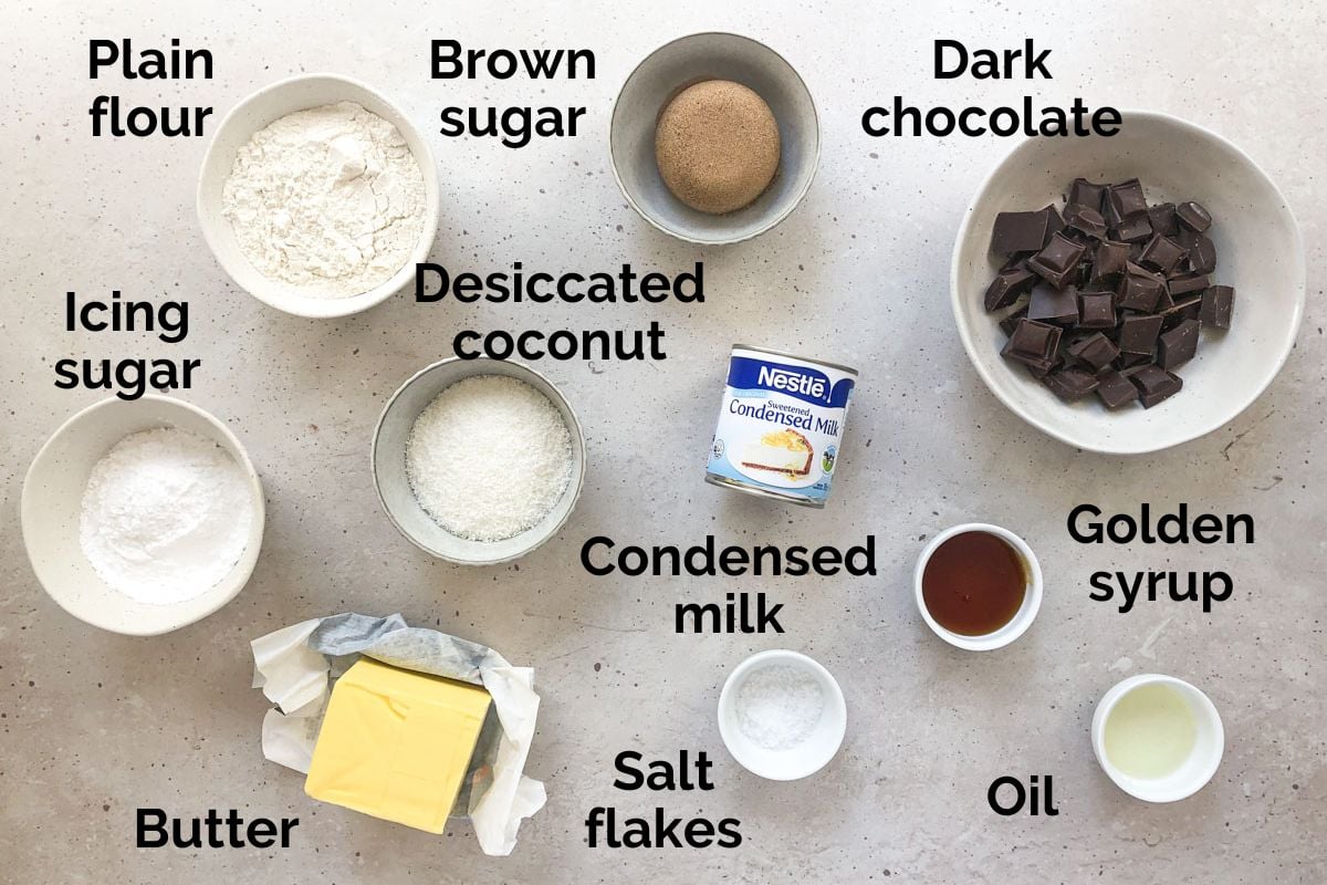 all ingredients for caramel slice, laid out on a table.