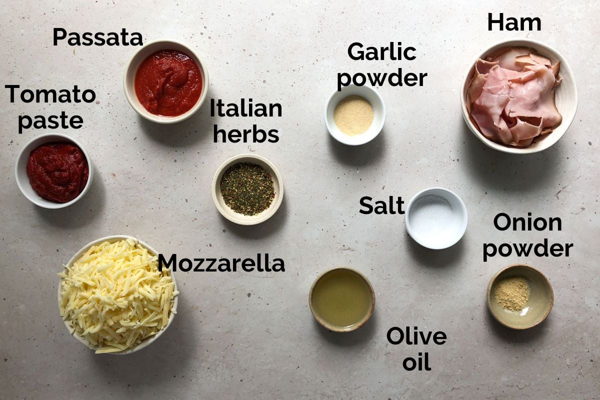 all ingredients for parmigiana sauce, laid out on a table.