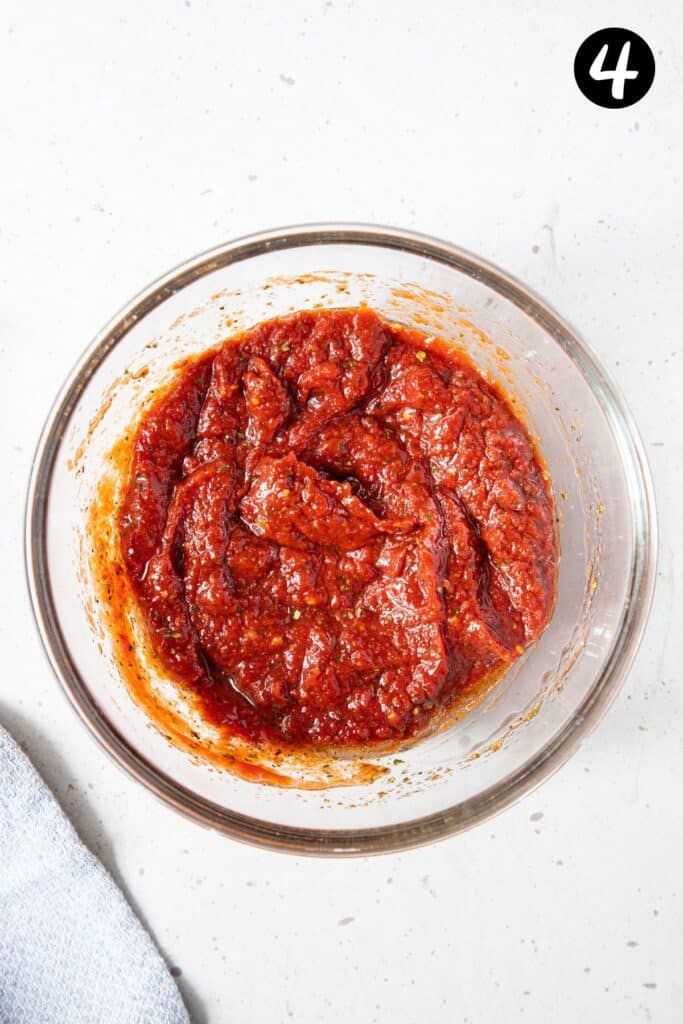 red sauce in a glass bowl.