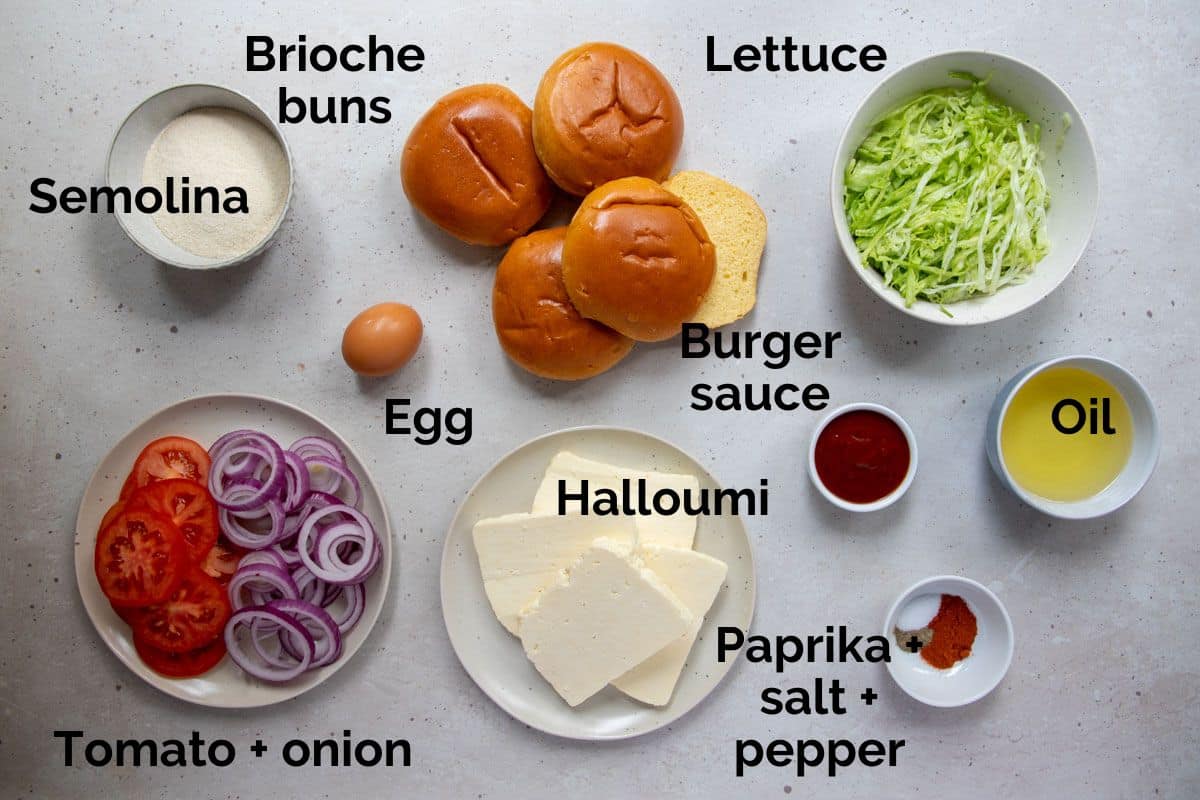 all ingredients for halloumi burgers, laid out on a table.