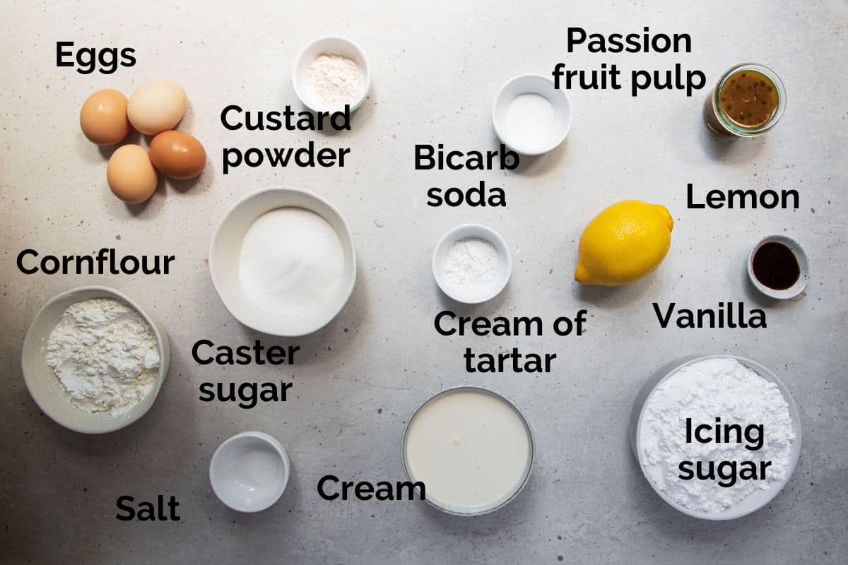 all ingredients for passion fruit sponge cake, laid out on a table.