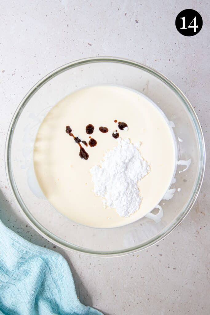 cream, vanilla and icing sugar in a bowl.