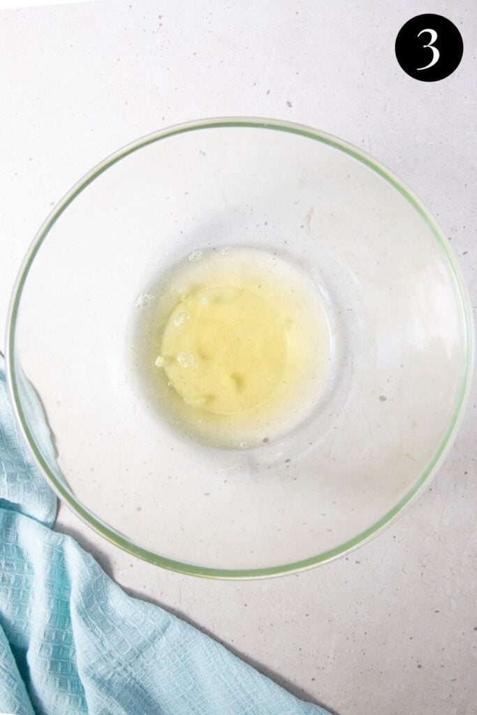 egg whites in a glass bowl.