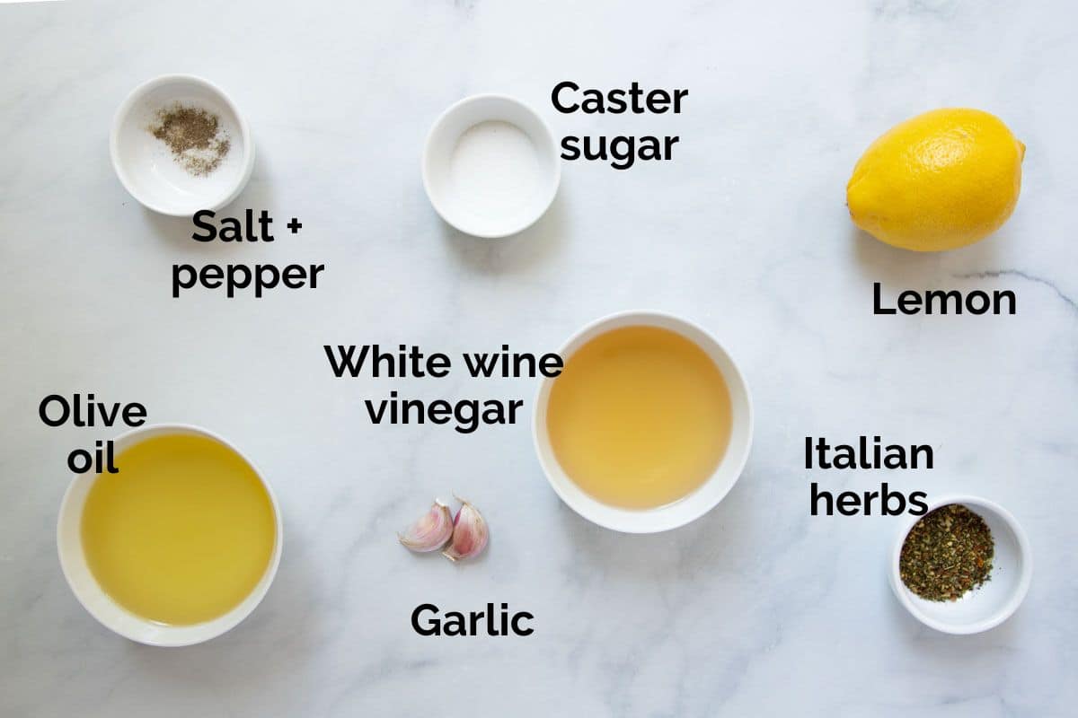 ingredients for Italian dressing, laid out on a table.