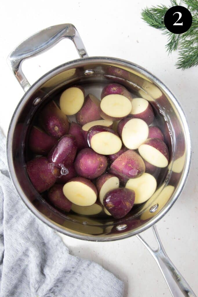potatoes in a pot of water.