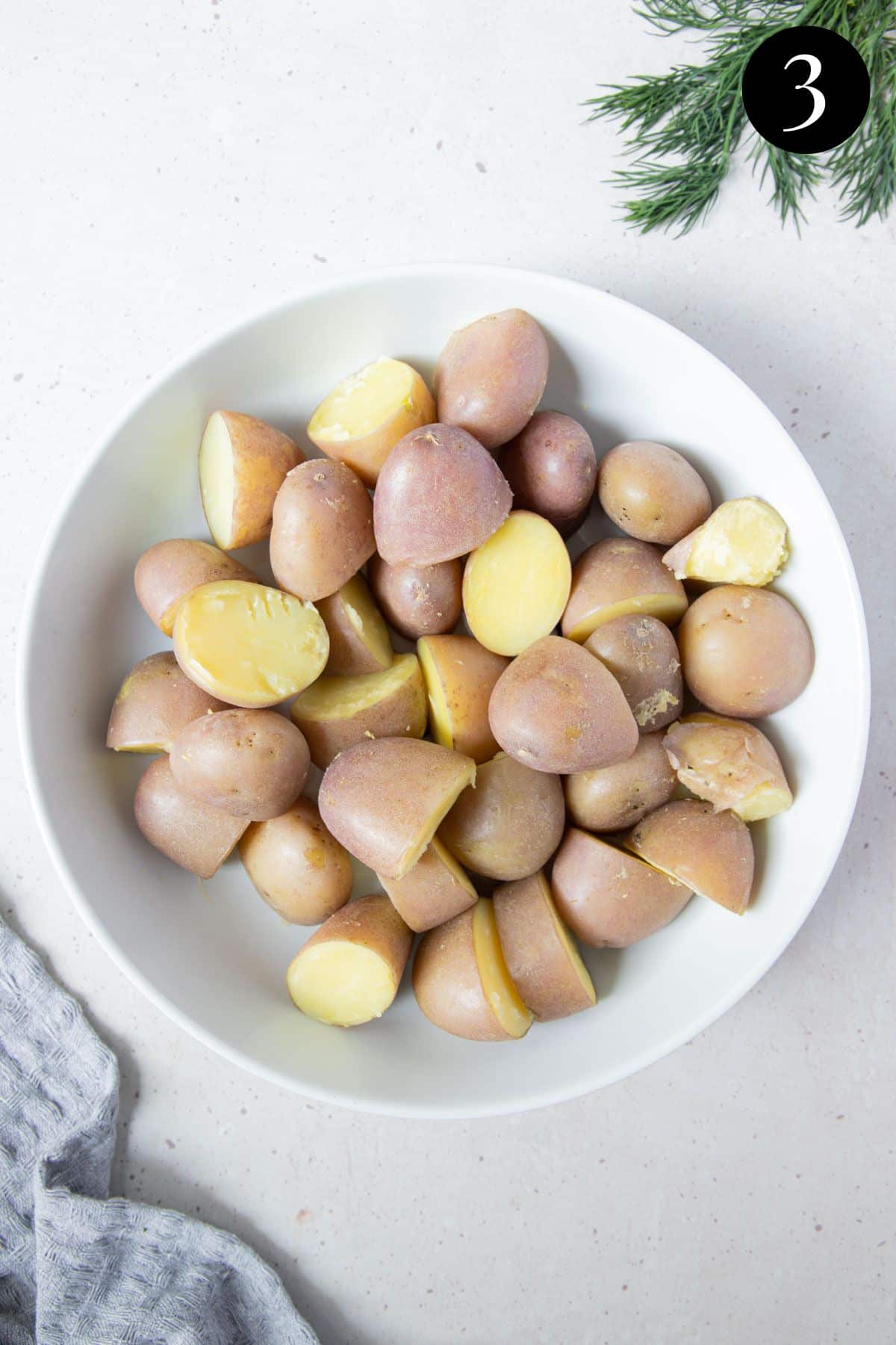 cooked potatoes in a salad bowl.