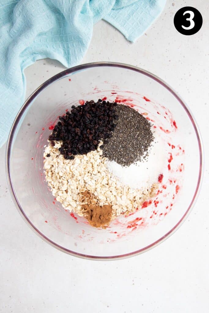 all ingredients for raspberry oatmeal cookies in a mixing bowl.