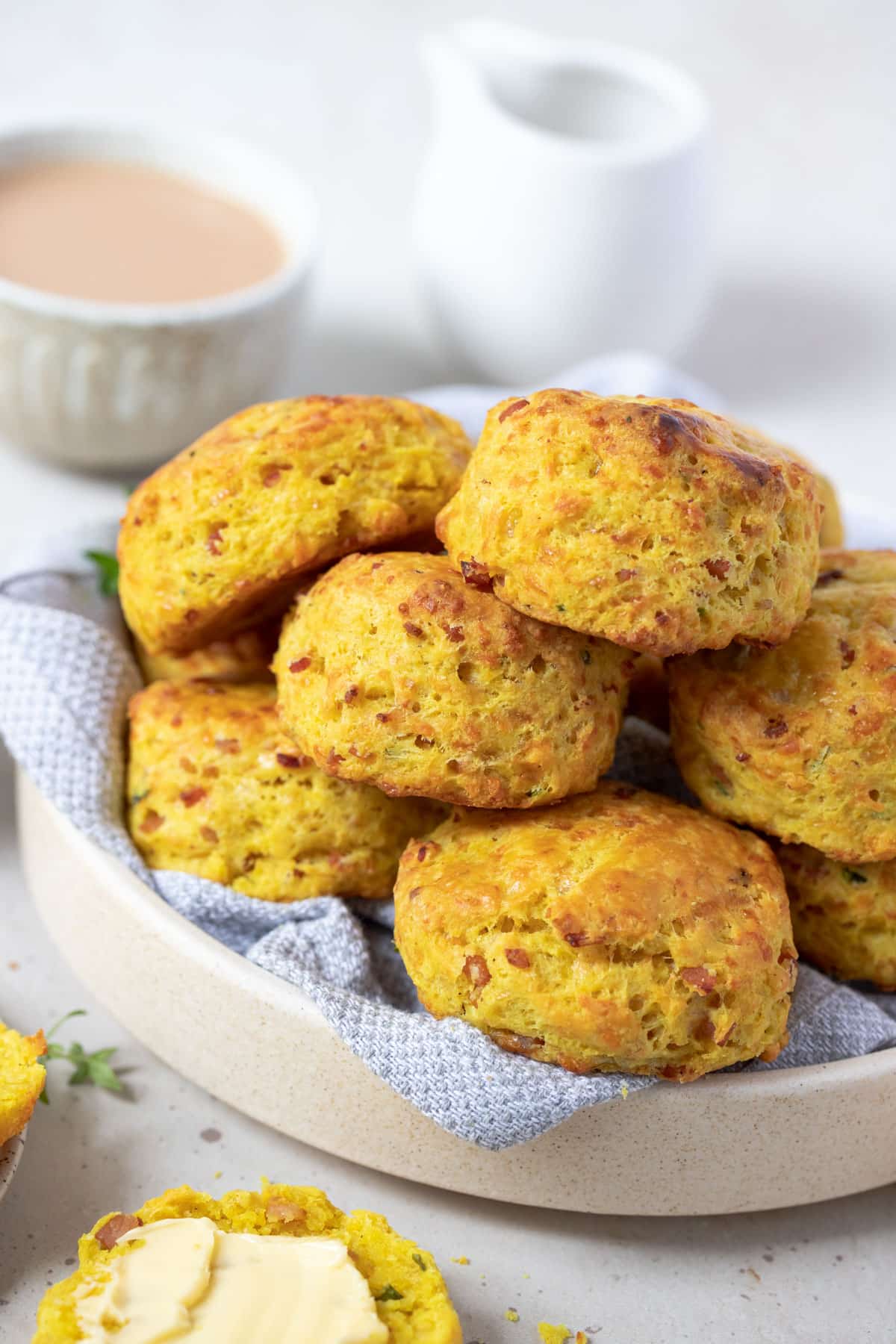 savoury scones in a bowl on a table.