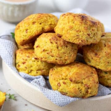 savoury scones in a bowl on a table.