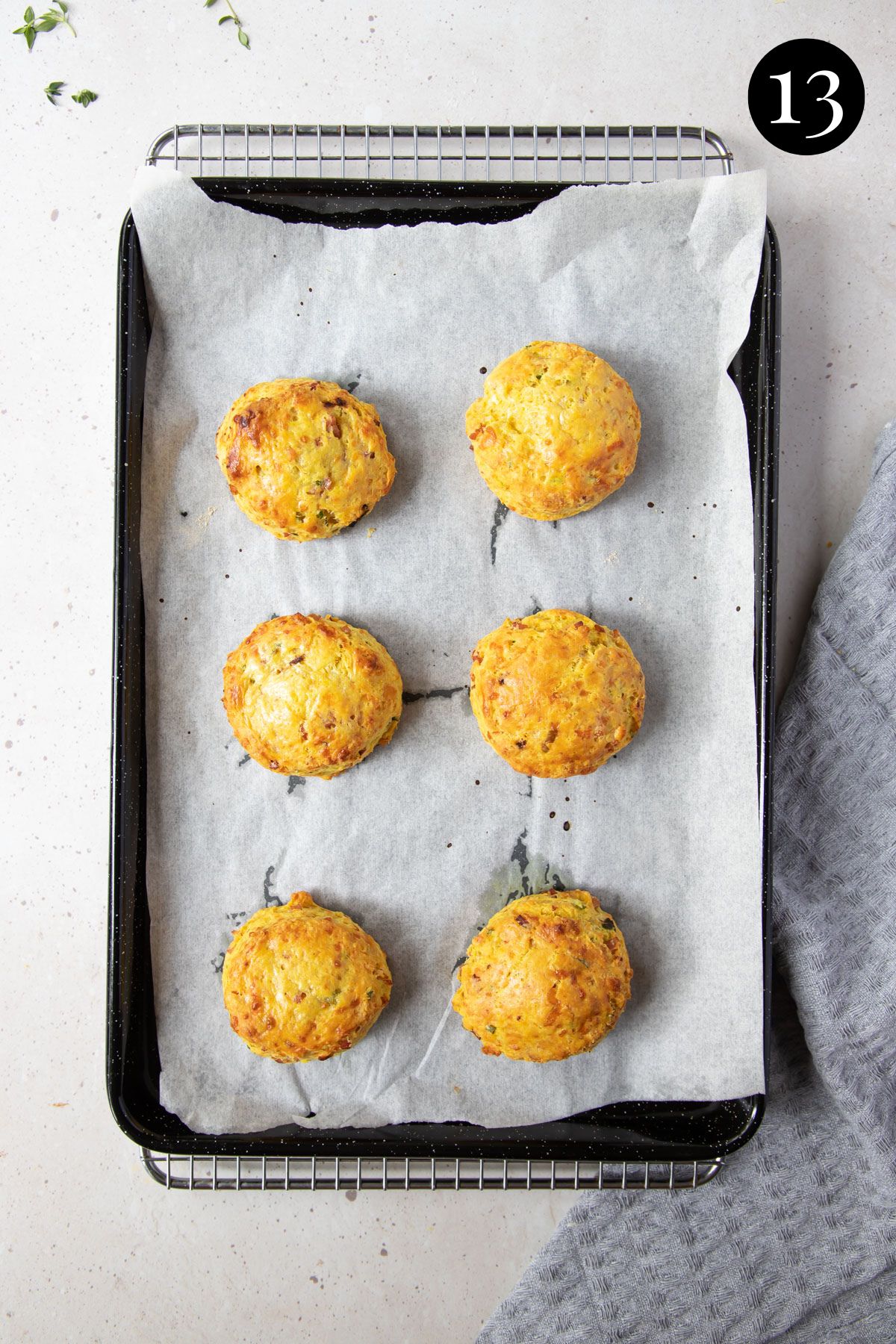 finished scones on a baking tray.