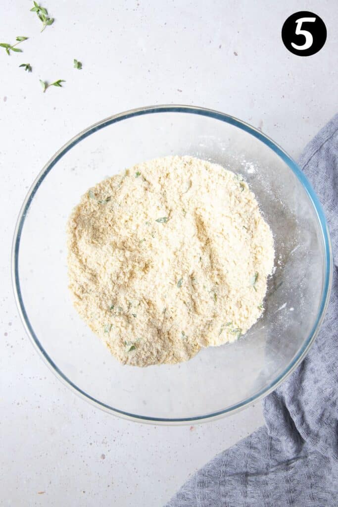 butter rubbed into flour, in a bowl.