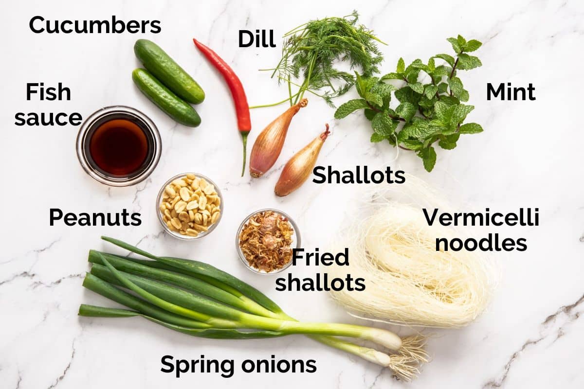 ingredients for vermicelli noodle salad, laid out on a table.