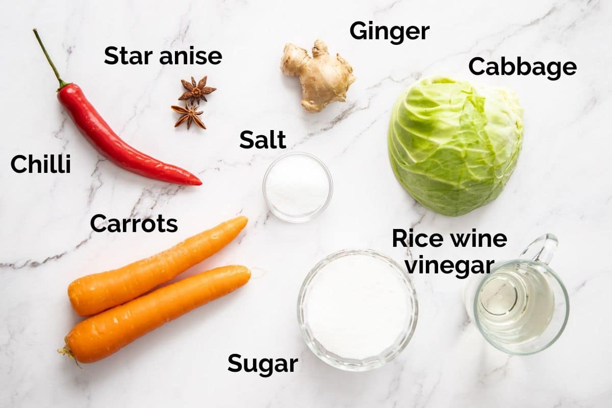 ingredients for pickled vegetables, laid out on a table.