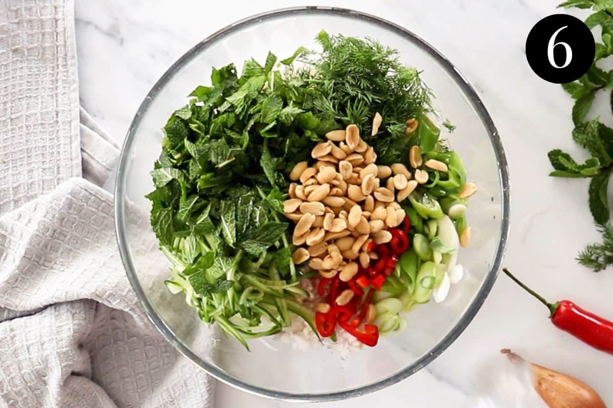 vermicelli noodle salad ingredients together in a bowl.