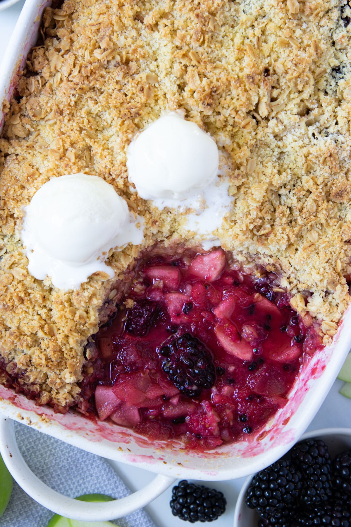 crumble in a baking dish, topped with ice cream.