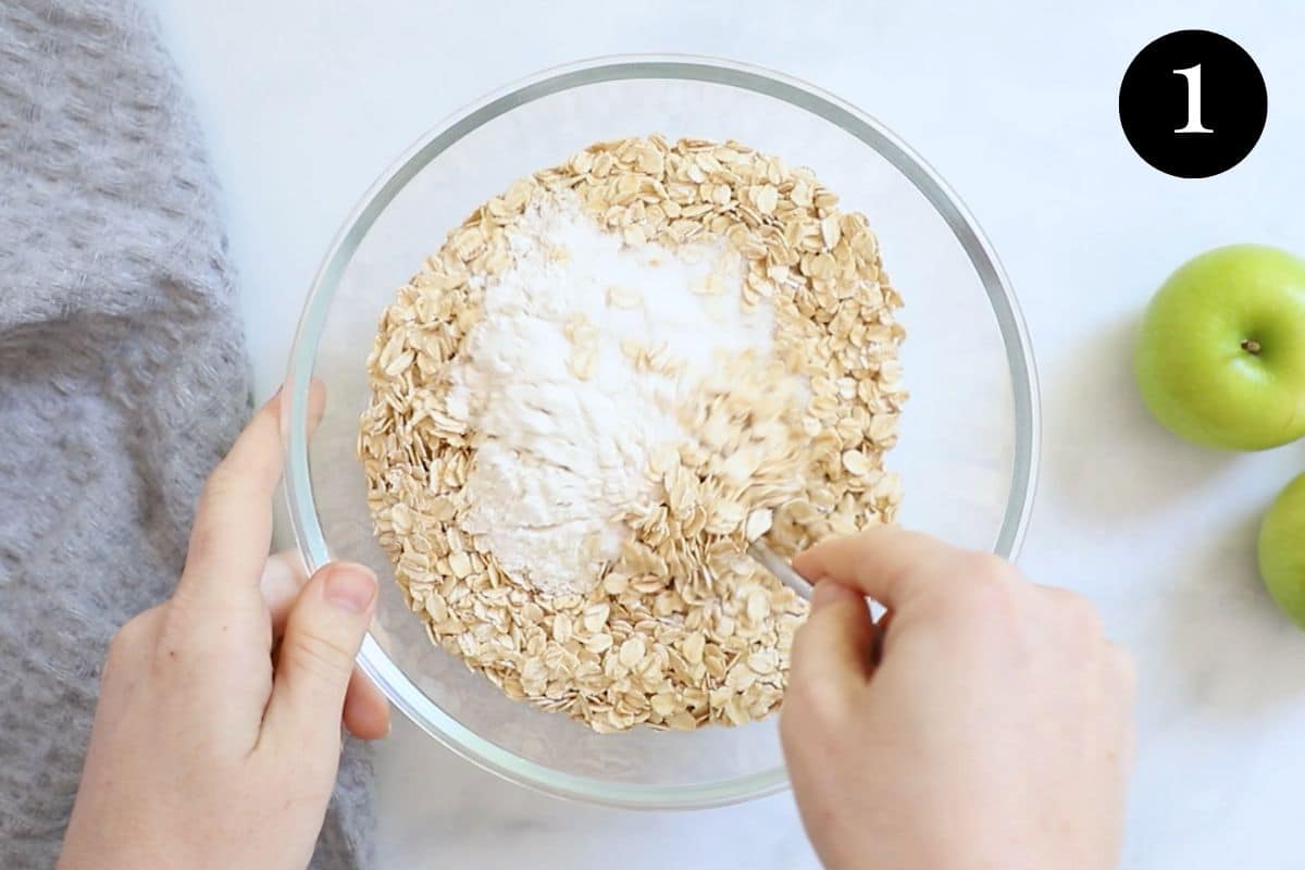 crumble ingredients being stirred in a bowl.