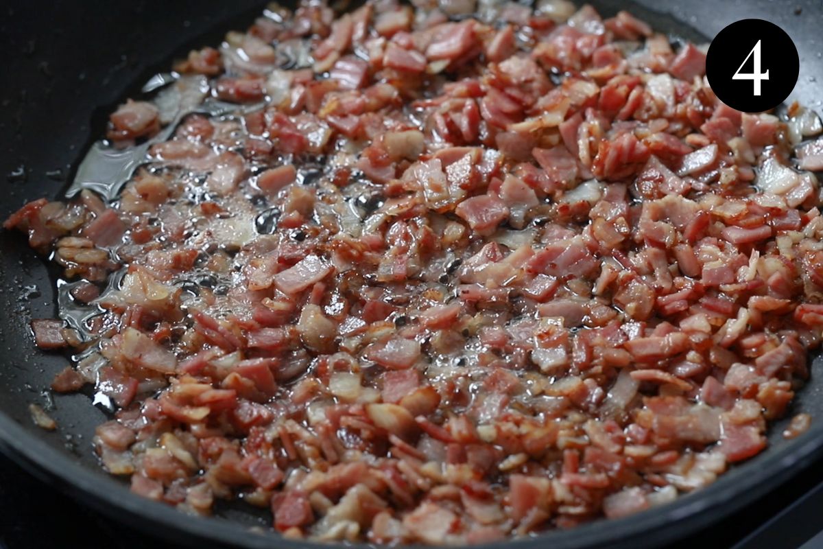 crisp bacon in a pan with oil.