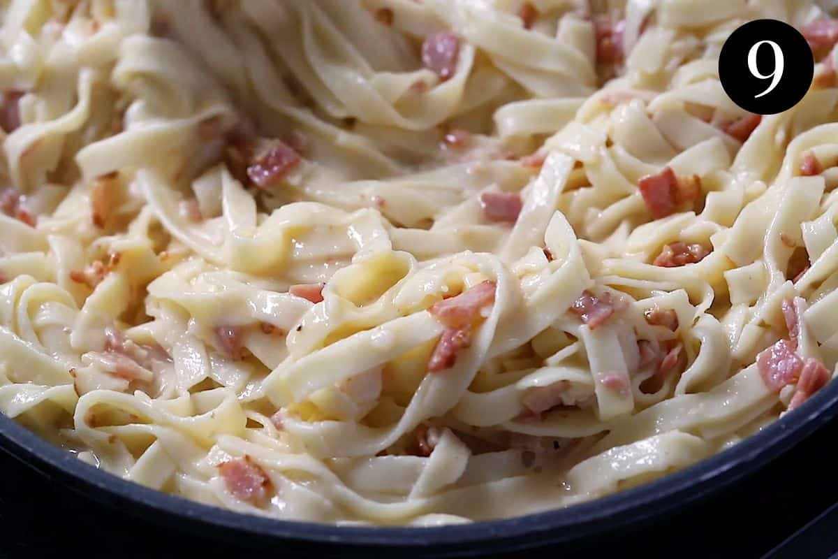 finished fettucine carbonara in a pan.