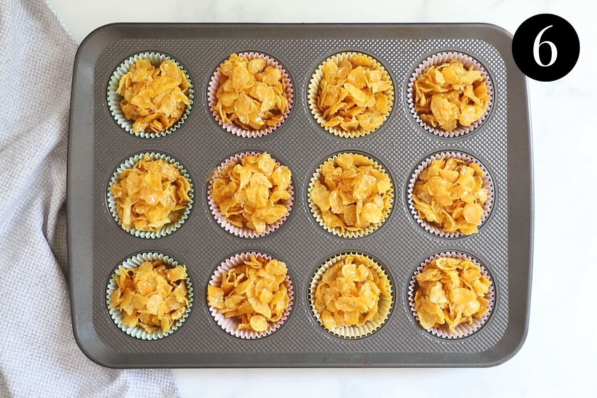 honey joy mixture in a cupcake tray lined with paper cases.