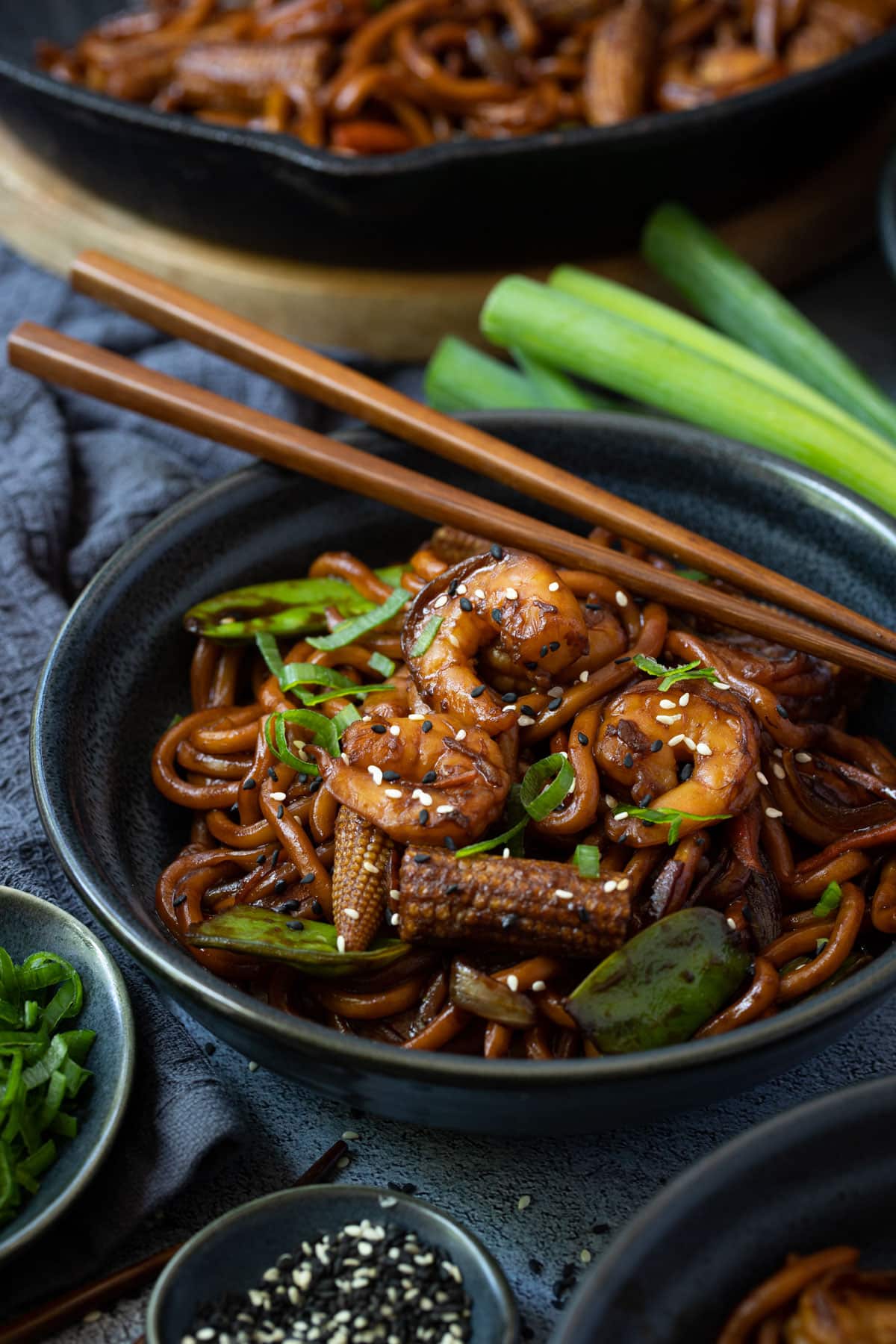 a bowl of prawn and noodle stir fry.