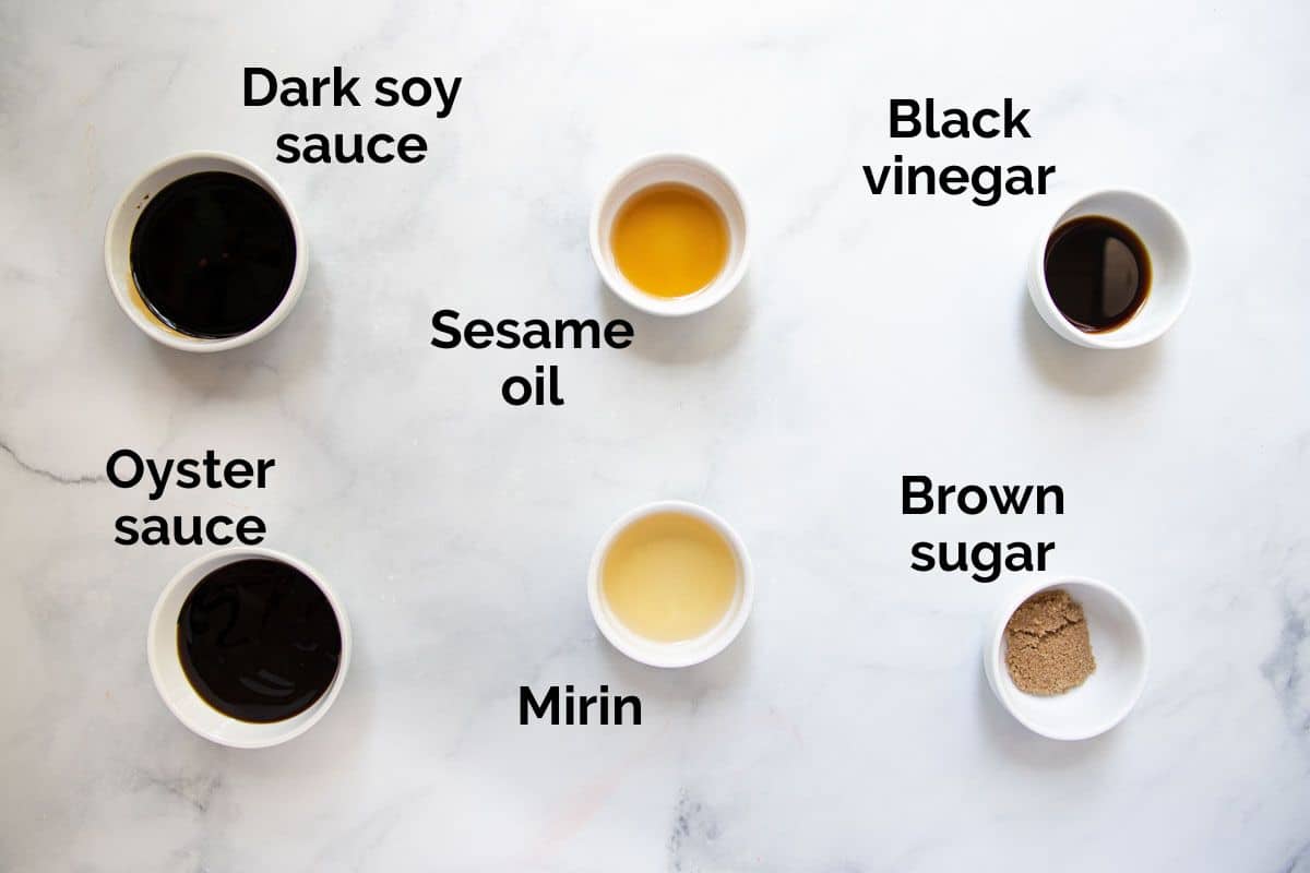 ingredients for stir fry sauce, laid out on a table.