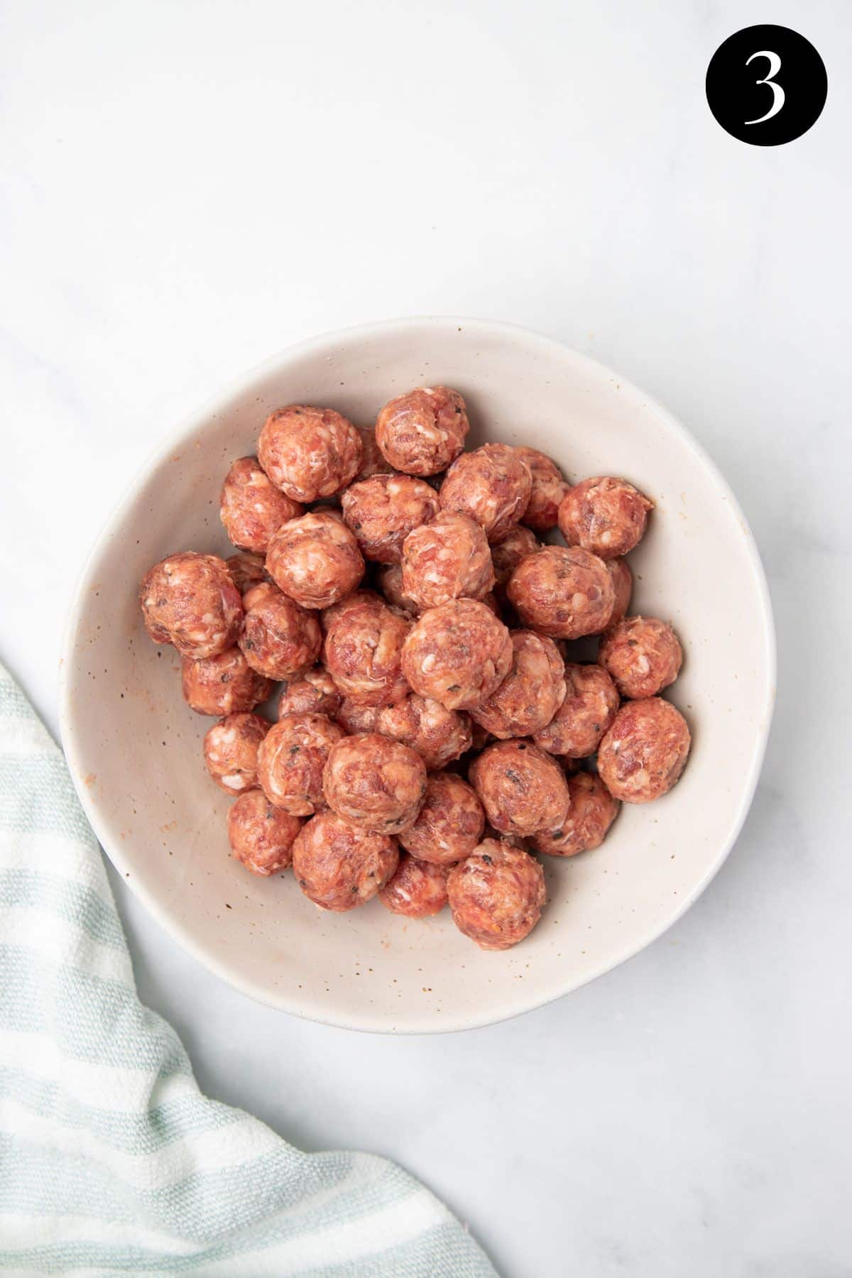 meatballs made with sausage meat in a bowl.