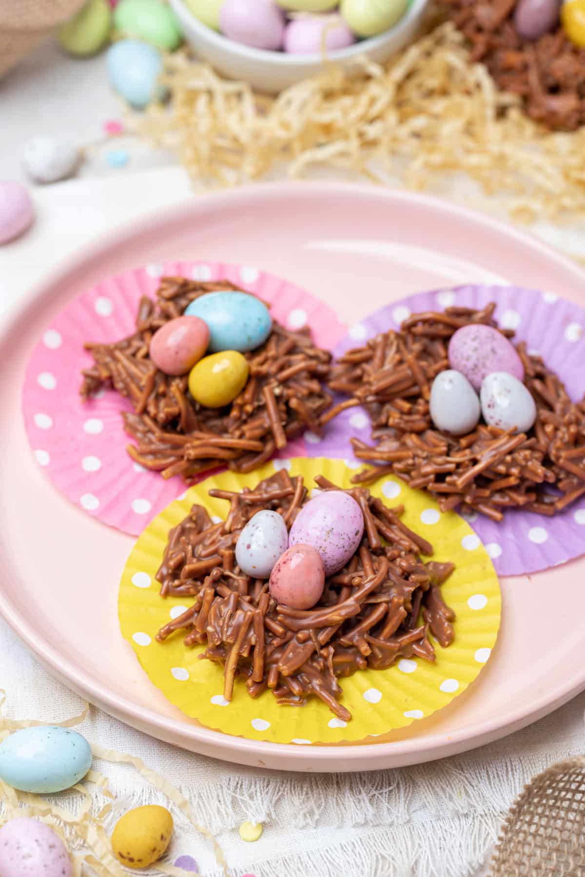 chocolate Easter nests arranged on colourful paper cases.
