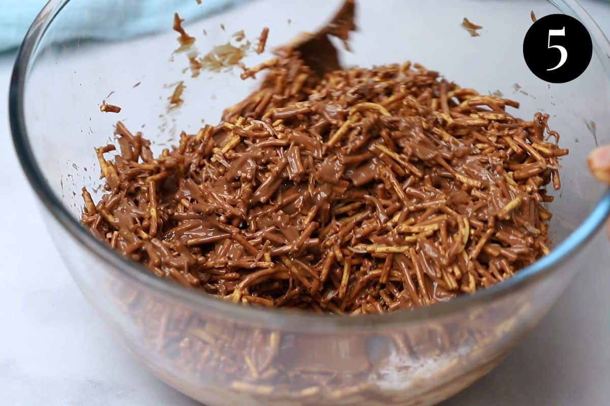 chocolate and noodle mixture in a glass bowl.