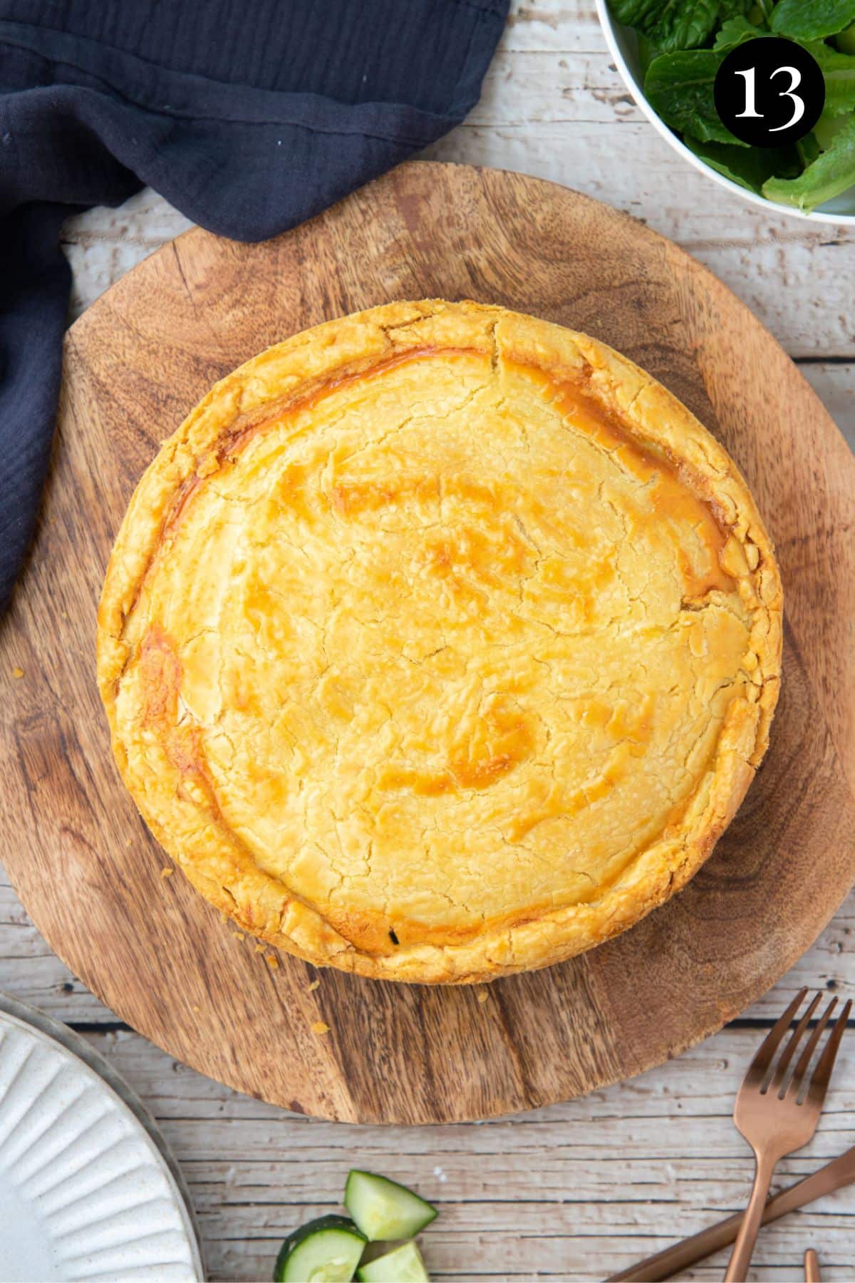 finished pie on a wooden board.