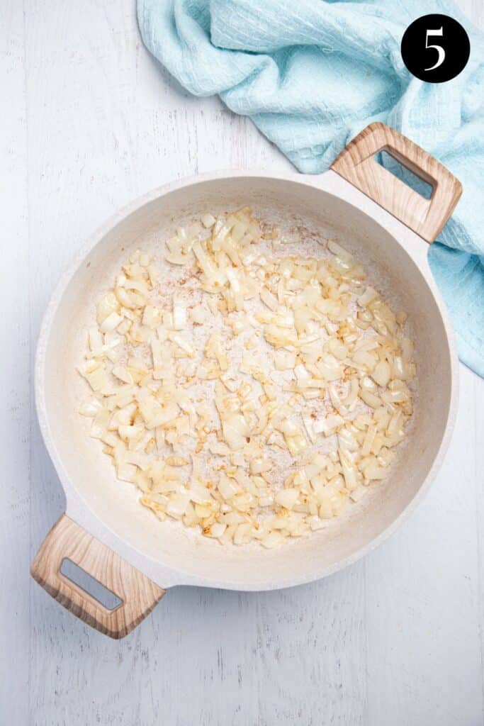 browned onion and garlic in a pan.