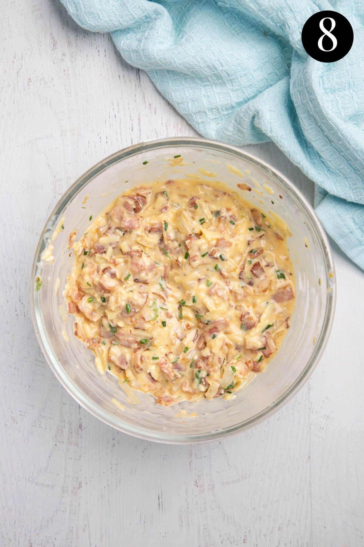 bacon and egg mixture in a mixing bowl.