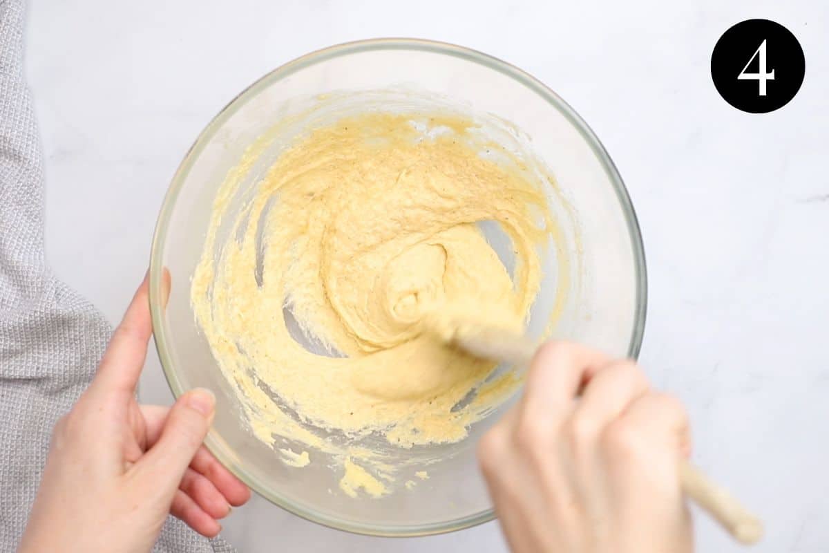 butter mixture being stirred in a mixing bowl.