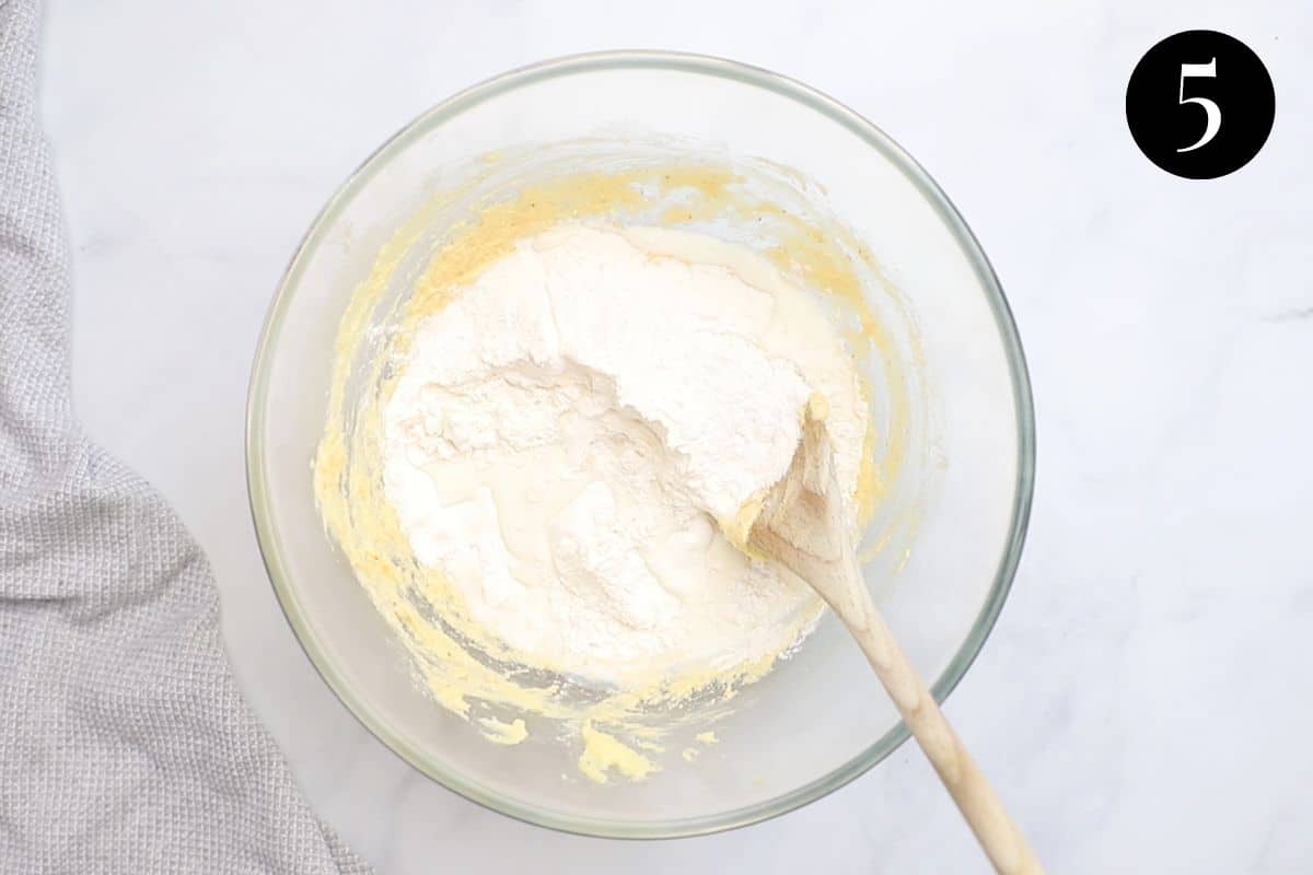 flour and milk added to butter mixture, in a bowl.
